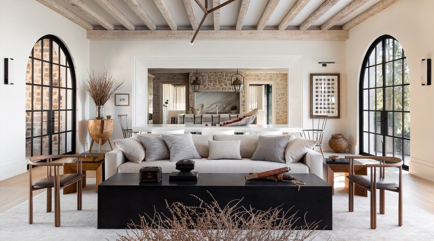 luxury modern mediterranean interior design; living room with exposed wood beams