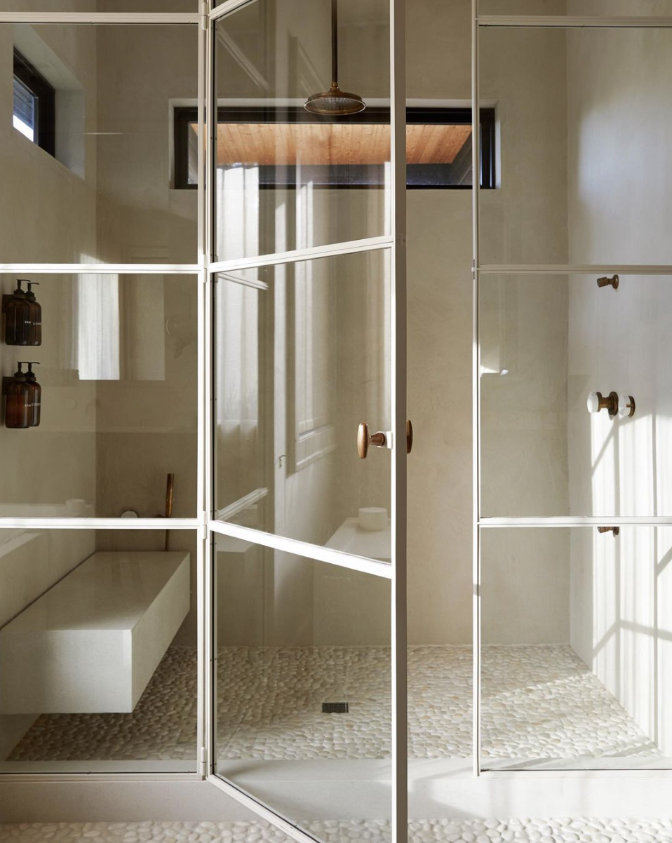white powder coated steel doors in a Belgian design shower