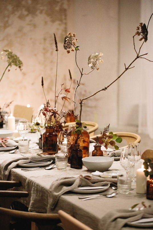 table decorating - branches and amber apothecary glass jars