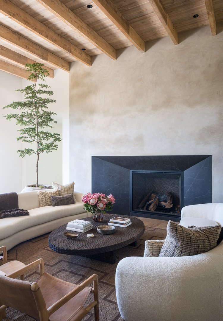 Neutral living room fireplace with limewashed walls